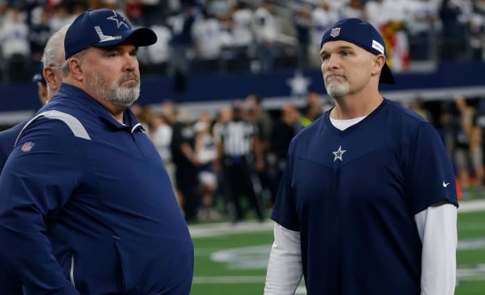 Cowboys coaches McCarthy and Quinn.